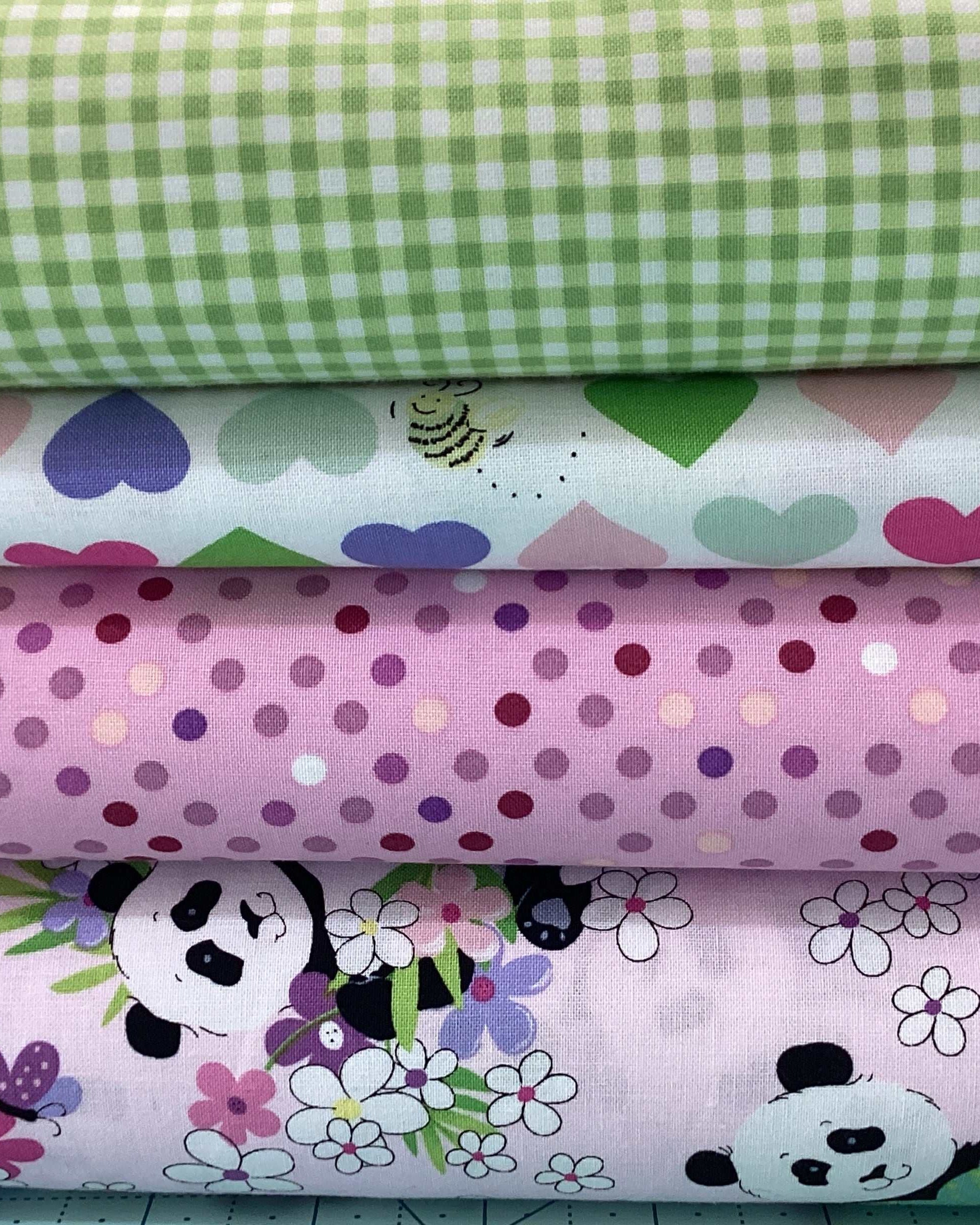 4 Yard Quilt Bundle with green gingham, heart print, purple polka dots, and panda floral fabrics