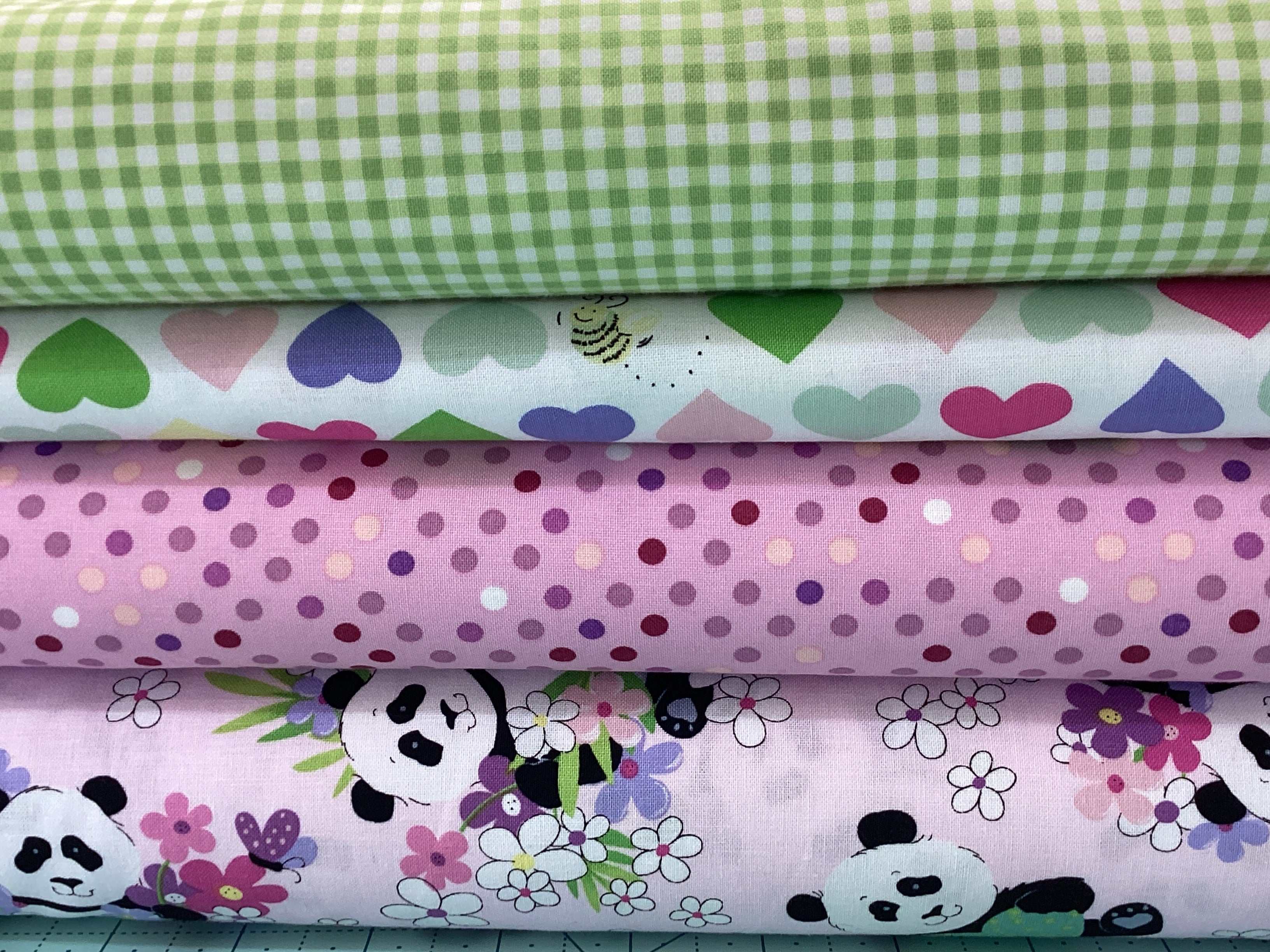 4 Yard Quilt Bundle with green gingham, heart print, purple polka dots, and panda floral fabrics