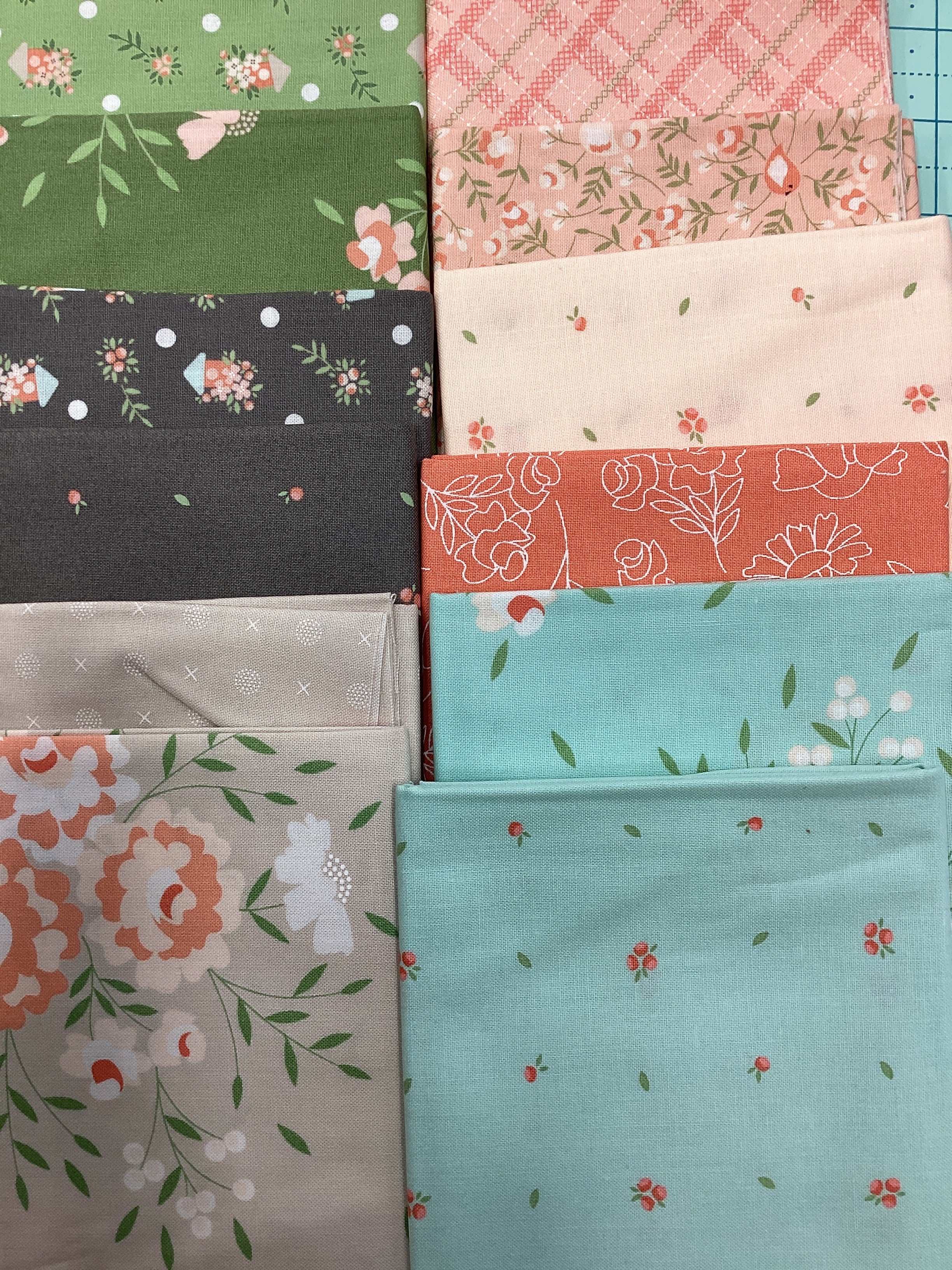 12 Fat Quarter Bundle with floral and patterned fabrics curated by Bella Rose Quilts