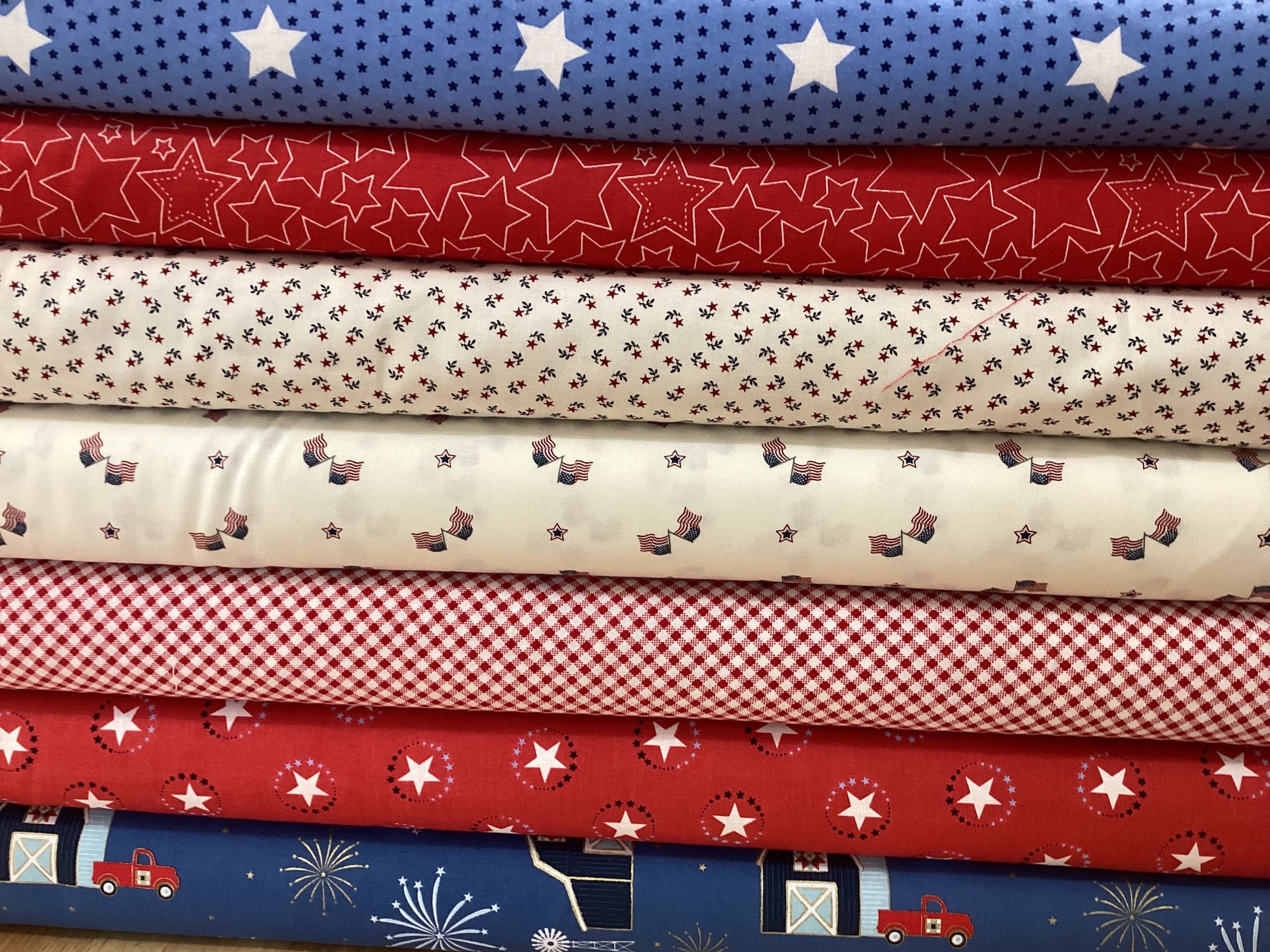 M50 Island Hopping Kit with patriotic red, white, and blue star and flag fabric bundles for quilting