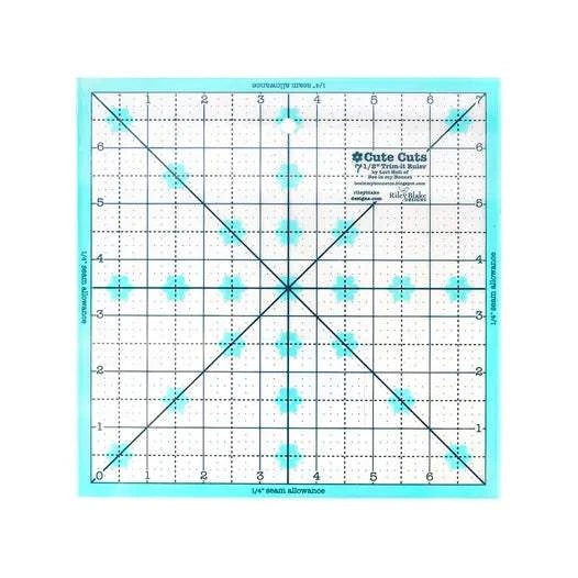 Lori Holt Cute Cuts 7.5" square ruler with clear aqua 1" grid, .25" seam allowance, and alignment lines for trimming blocks