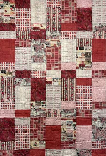 MIRANDA by Tim Holtz 42x60 quilt pattern with red and pink patchwork design