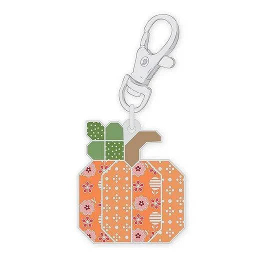 Bee Dots Pumpkin Enamel Happy Charm keychain with floral and bee design by Lori Holt