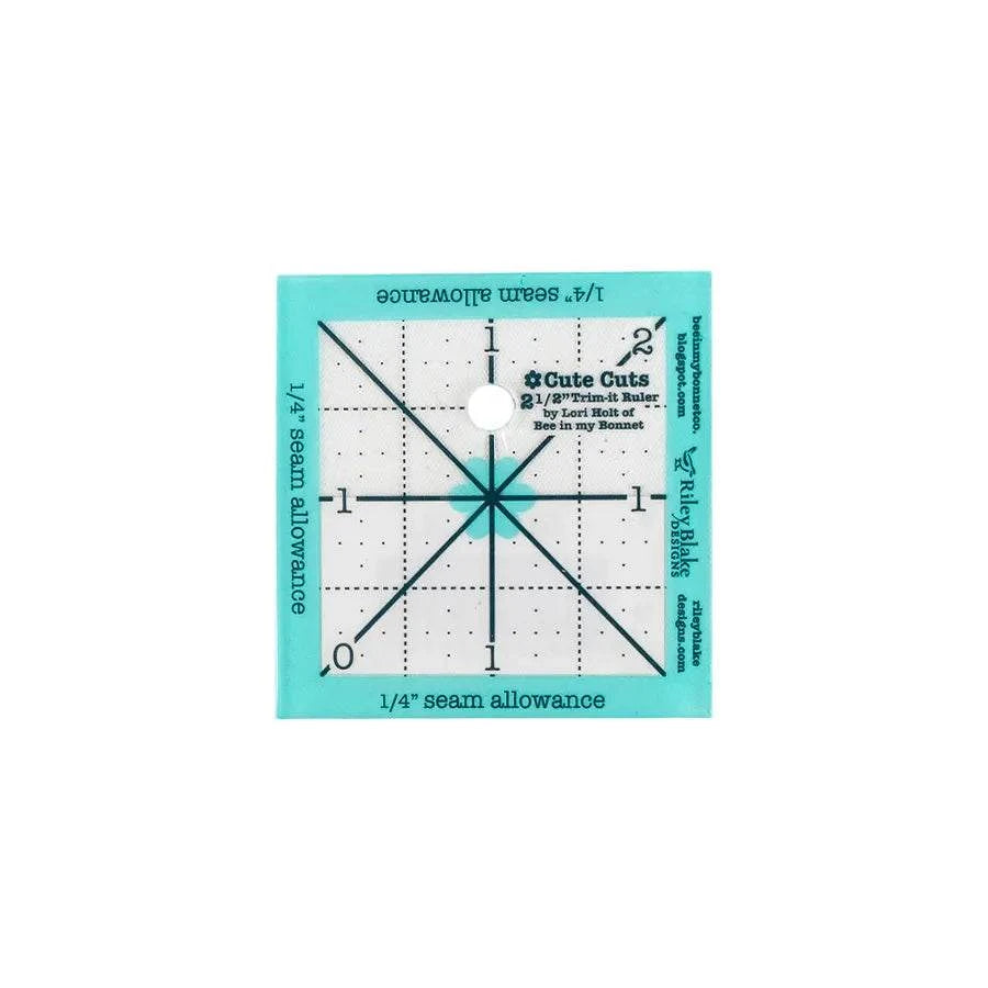 Cute Cuts Trim It 2.5 inch square ruler with 1/4 inch seam allowance markings by Lori Holt for precise quilting trimming