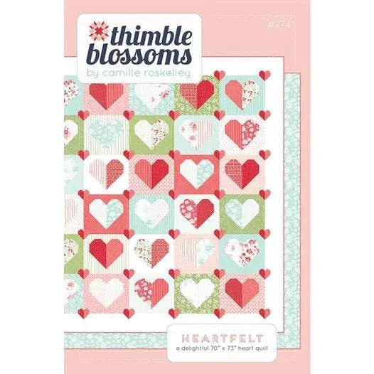 Heartfelt Quilt Pattern by Thimble Blossoms featuring heart-themed quilt blocks in pastel tones and red accents