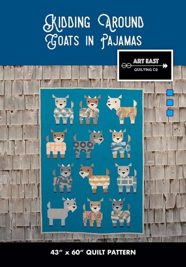 Kidding Around Goats in Pajamas quilt pattern featuring goats in colorful pajamas on blue background