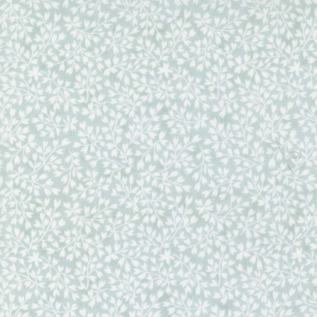 Bliss by 3 Sisters fabric with gray background and white delicate floral pattern