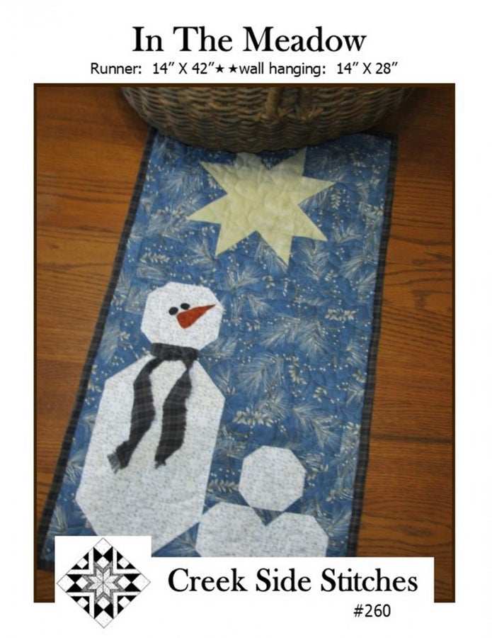 In the Meadow snowman quilt table runner with star design by Creek Side Stitches