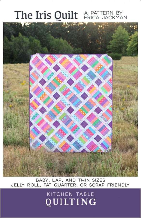 The Iris Quilt colorful patchwork baby lap twin sizes pattern by Erica Jackman outdoors
