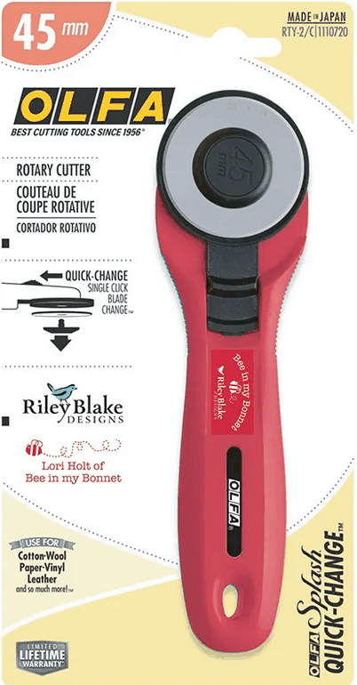 Olfa 45mm rotary cutter in red with quick-change blade feature for left or right-handed use