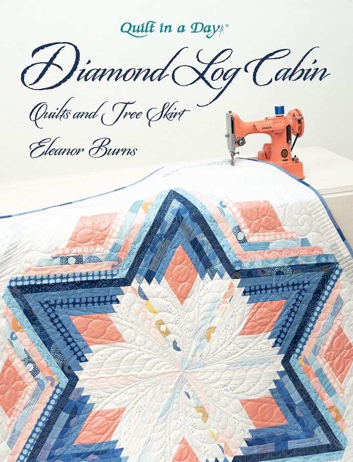 Diamond Log Cabin Quilts book cover with blue and coral quilt star pattern and vintage sewing machine