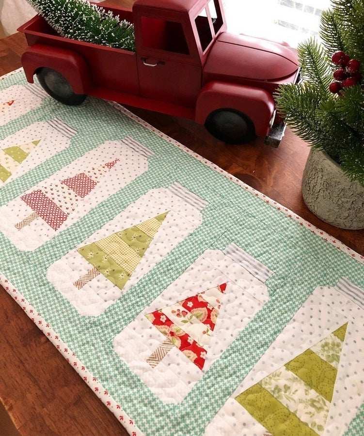 Christmas Jars Table Runner with fabric mason jar Christmas tree patterns on green check background