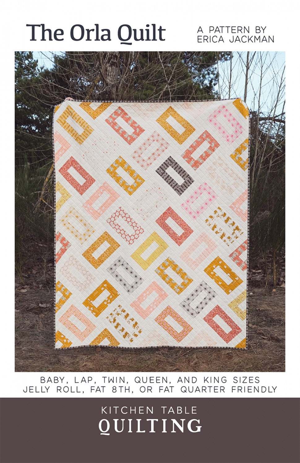 Orla by Kitchen Table Quilting geometric pattern quilt in pastel colors perfect for various sizes.