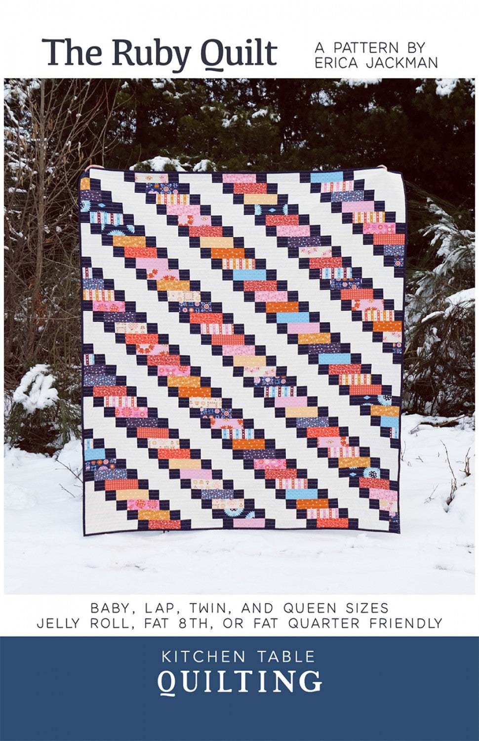 Ruby by Kitchen Table Quilting pattern showcasing a colorful strip pieced quilt in baby, lap, twin, and queen sizes.