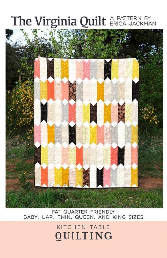 The Virginia Quilt pattern displayed with colorful vertical strips in an outdoor setting