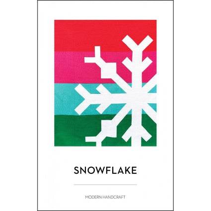 Snow Flake Quilt Pattern by Nicole Daksiewicz with colorful stripes and modern snowflake design