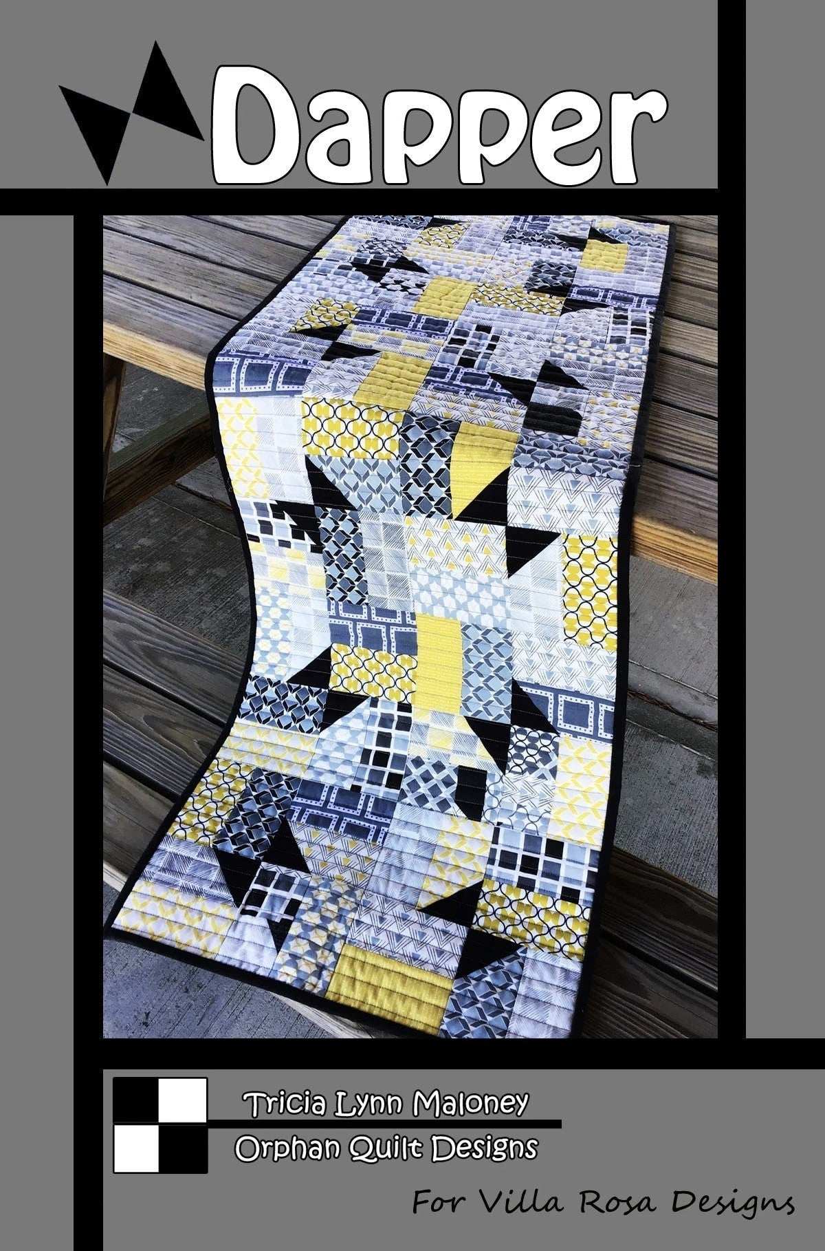 Dapper by Tricia Lynn Maloney quilt pattern featuring modern geometric design in yellow, gray, and black colors.