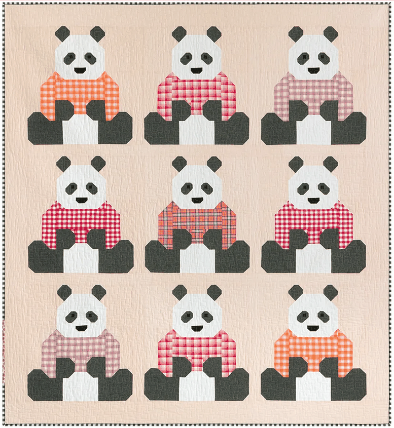 Pandas in Sweaters Quilt Kit featuring pandas in colorful gingham sweaters on a quilt top