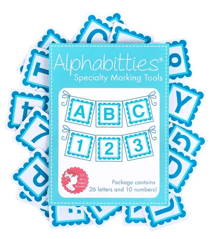 Blue Alphabitties Specialty Marking Tool with 26 letters and 10 numbers for fabric labeling and row marking
