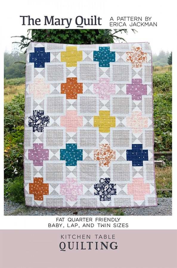 Mary Quilt Pattern with colorful plus sign blocks on a white and gray background in baby, lap, or twin size options