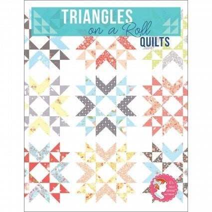 Triangles on a Roll quilt designs featuring colorful half square triangle patterns by It's Sew Emma