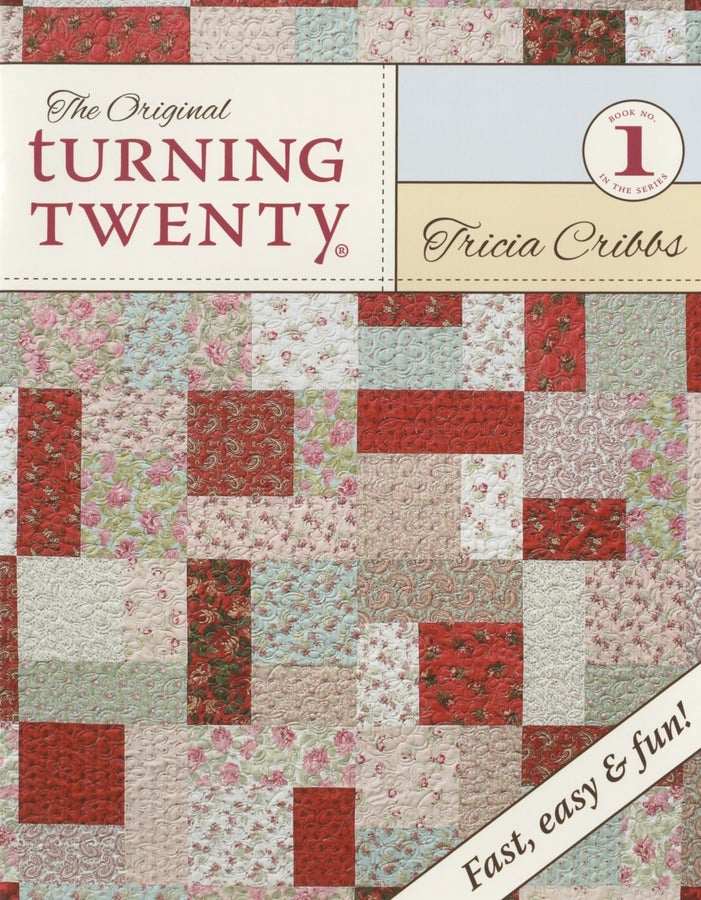 Turning Twenty quilt pattern cover by Tricia Cribbs with red and floral patchwork blocks