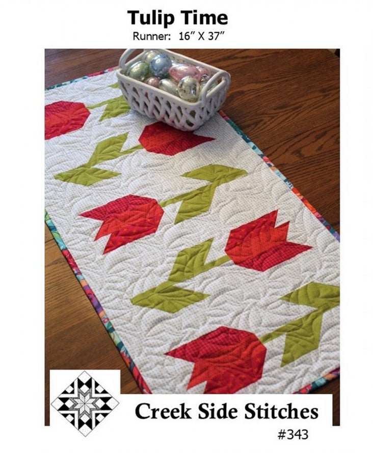 Tulip Time Quilt Pattern table runner with red tulip design measuring 16x37 inches by Creek Side Stitches