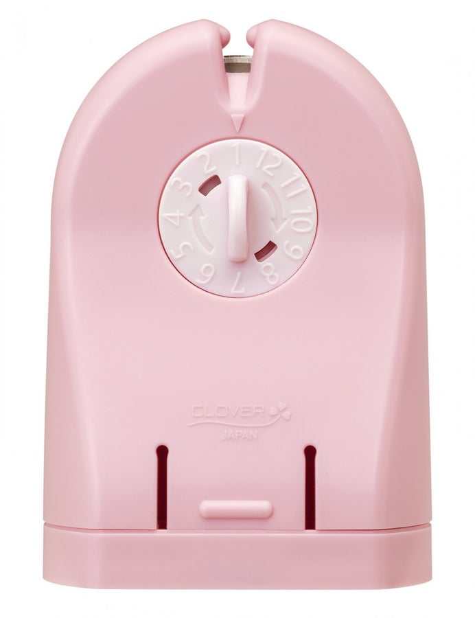 Pink Quick Cut Thread Cutter with adjustable dial and replaceable rotary blade for cutting quilt chains