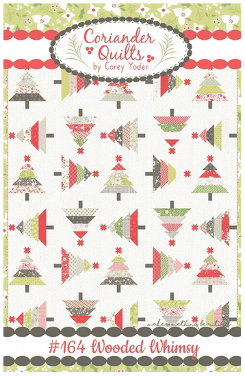 Wooded Whimsy quilt pattern featuring festive trees in Holliberry fabric by Corey Yoder