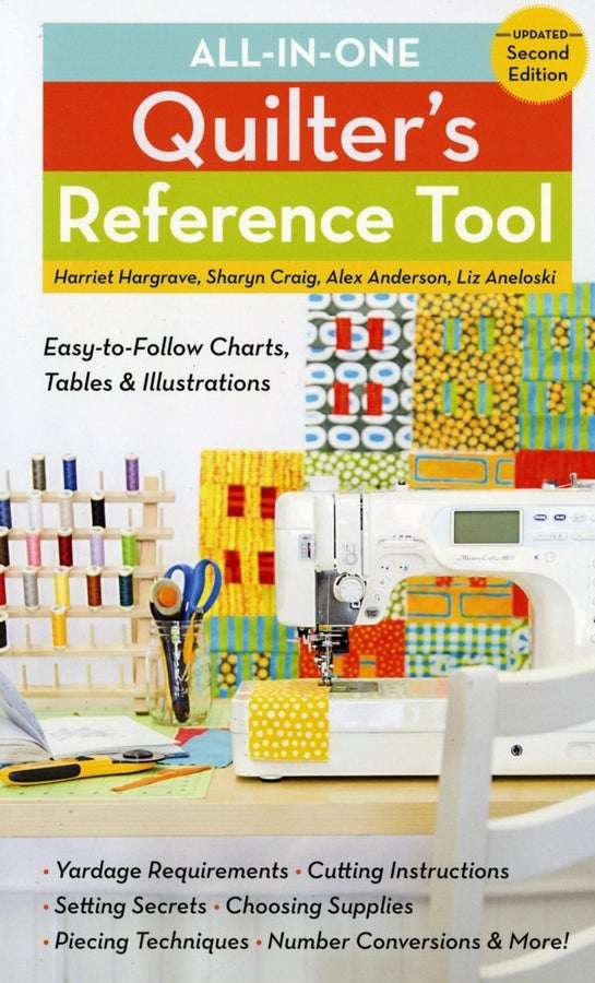 All-In-One Quilter's Reference Tool book cover with sewing machine and quilting supplies on table