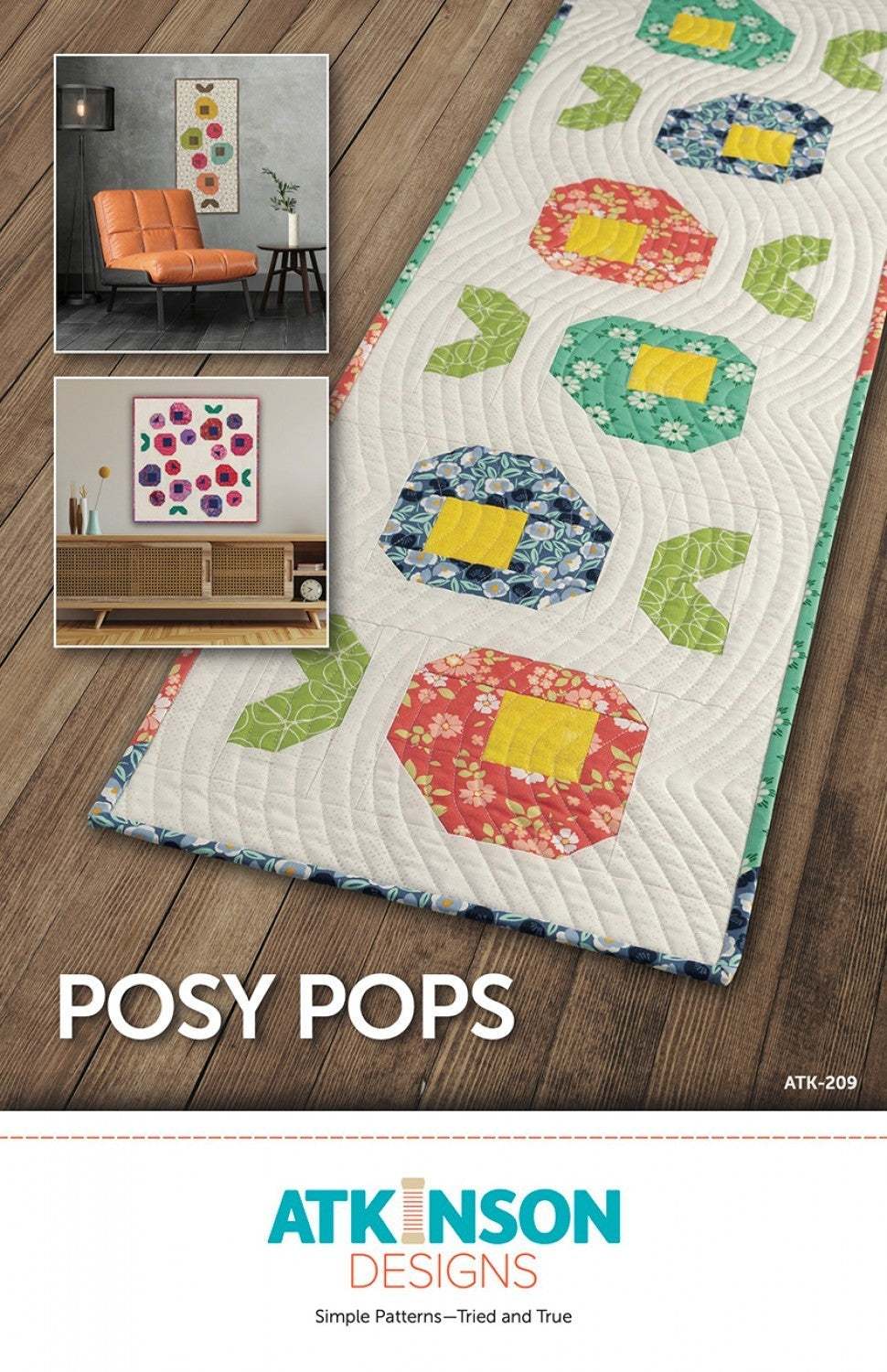 Posy Pops Quilt Pattern with colorful floral quilt runner on wooden floor by Atkinson Designs