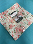 Frida Lap Size Quilt Kit with fabrics, pattern, accent, and binding for sunbonnet quilt sewing project
