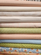 Surf's Up Bundle quilting fabrics with coordinating patterns for Hang Ten and Riptide quilts