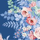 Close-up of Something Blue Whimsyflower Night fabric by TILDA with blue and white floral pattern