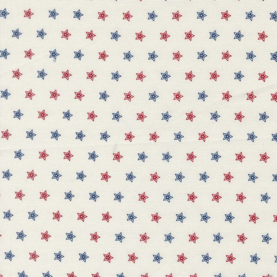 American Gatherings III fabric by Primitive Gatherings with red and blue star pattern on cream background