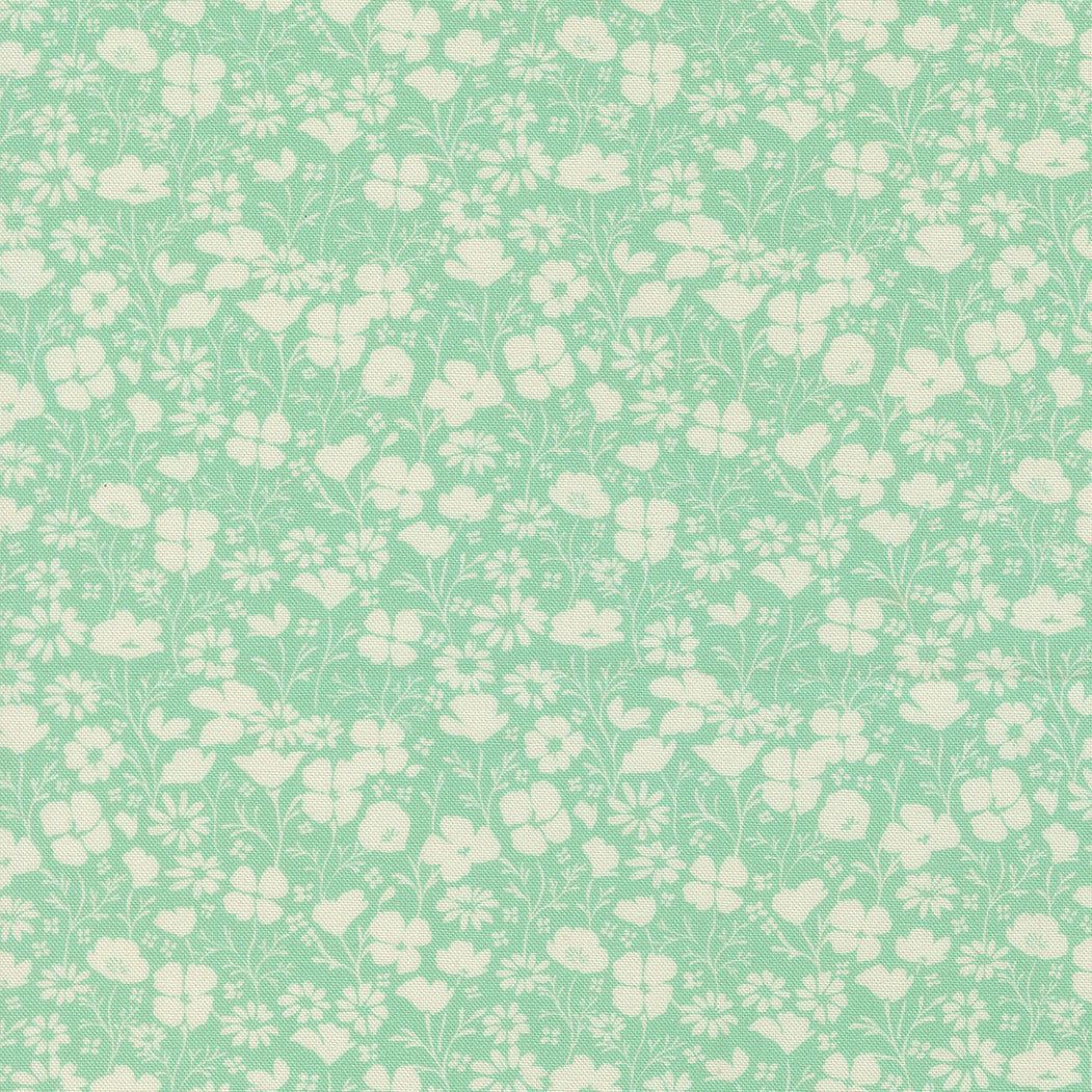 Cannon Beach fabric with poppy field and pond design by Crystal Manning for Moda Fabrics