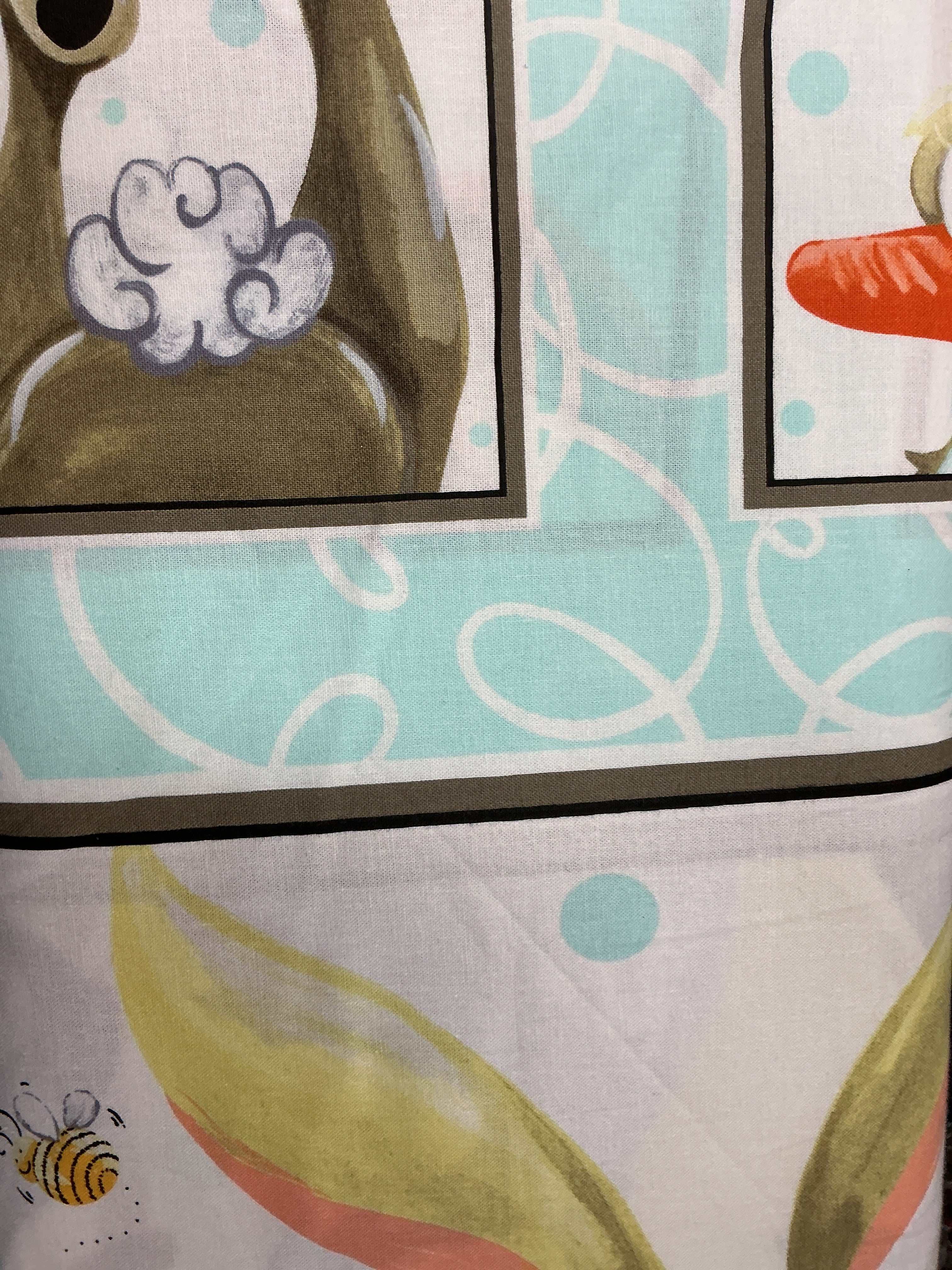 End of Bolt Sale 736 fabric panel display with colorful textiles