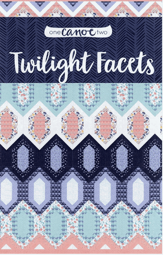 One Canoe Two Twilight Facets quilt pattern with geometric pastel and navy design