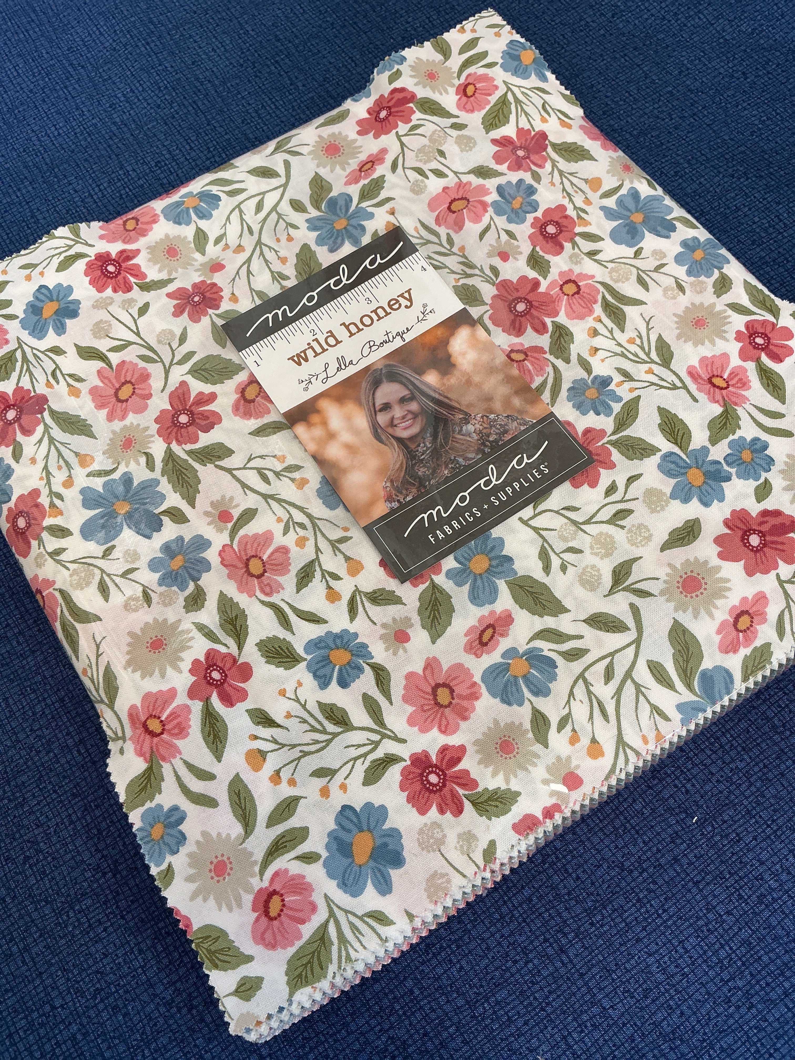 Frida Lap Size Quilt Kit with 12 half-yard fabric cuts, free digital pattern, and binding for lap-size quilt crafting