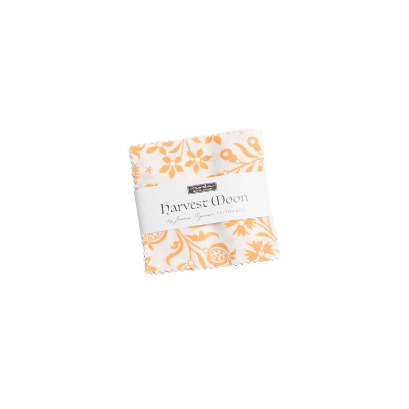 Harvest Moon Mini Charm Pack by Fig Tree and Co. showcasing fall-inspired geometric and foliage fabric strips