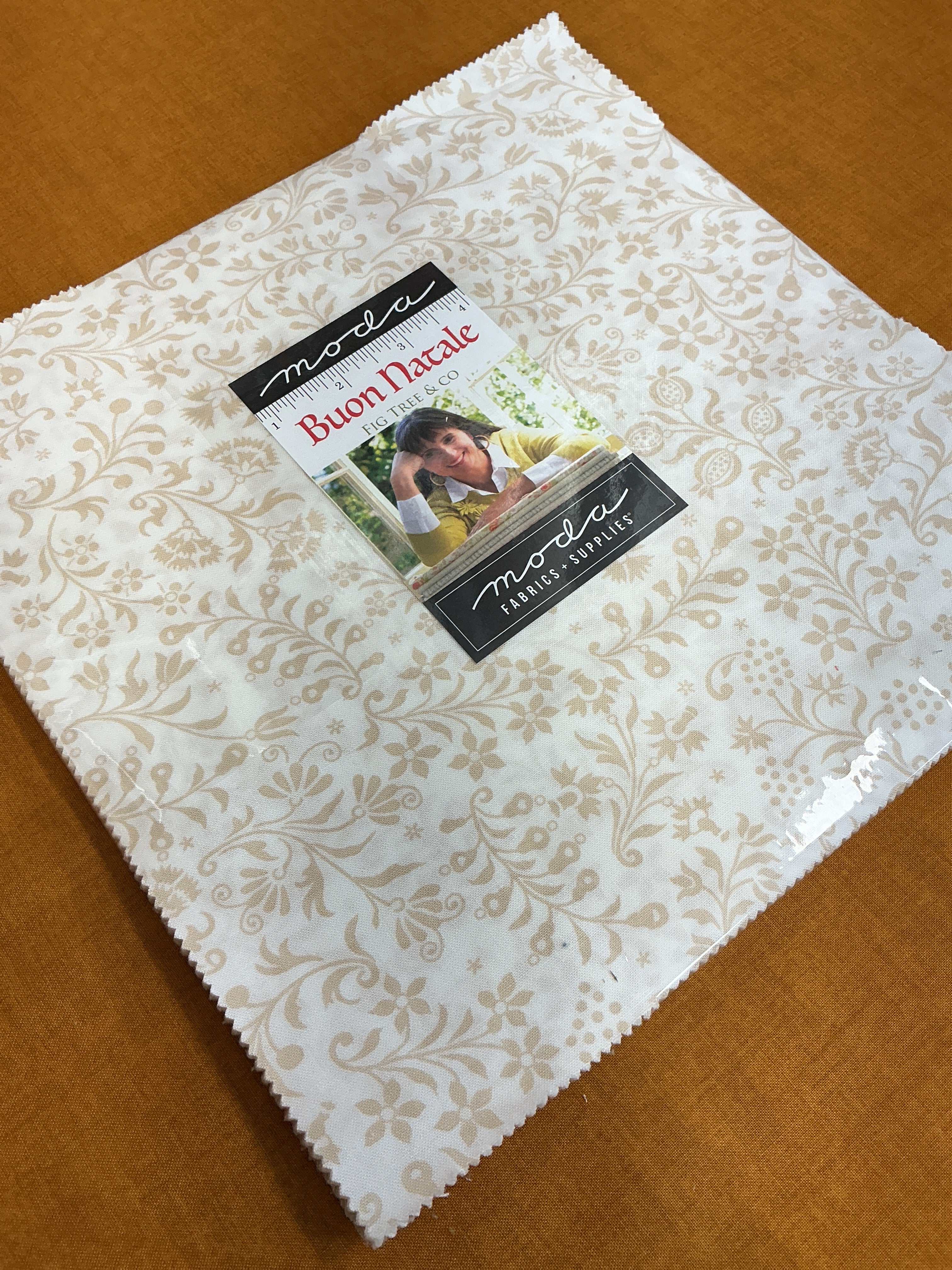 Frida Lap Size Quilt Kit with fabric cuts, digital pattern, and sewing accessories for lap quilt crafting