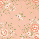 Abloom by Corey Yoder floral fabric with pink and white springtime flower pattern on peach background