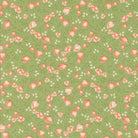 Abloom by Corey Yoder Cucumber Songbird Florals fabric with birds and flowers on green background