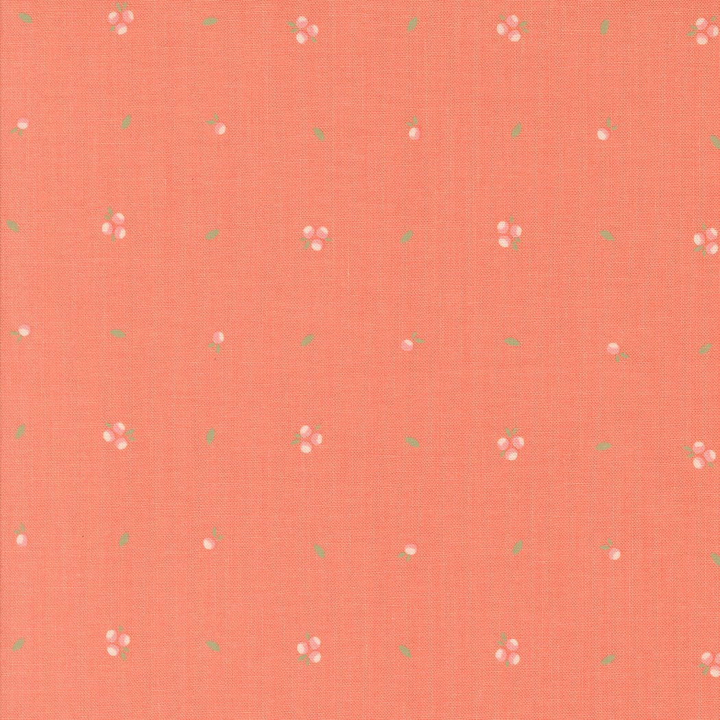 Abloom by Corey Yoder coral fabric with small floral print for quilting and crafts