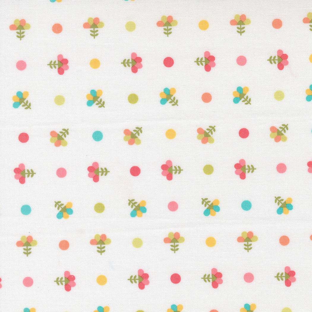 In the Garden fabric by Corey Yoder with colorful dotted sprig pattern on off-white background