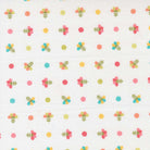 In the Garden fabric by Corey Yoder with colorful dotted sprig pattern on off-white background