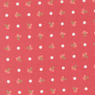 Dotted Sprig Strawberry fabric with pink floral sprigs and white dots on coral background from In the Garden by Corey Yoder
