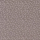 In the Garden Sugar Snap Slate fabric by Corey Yoder with white floral dots on slate background