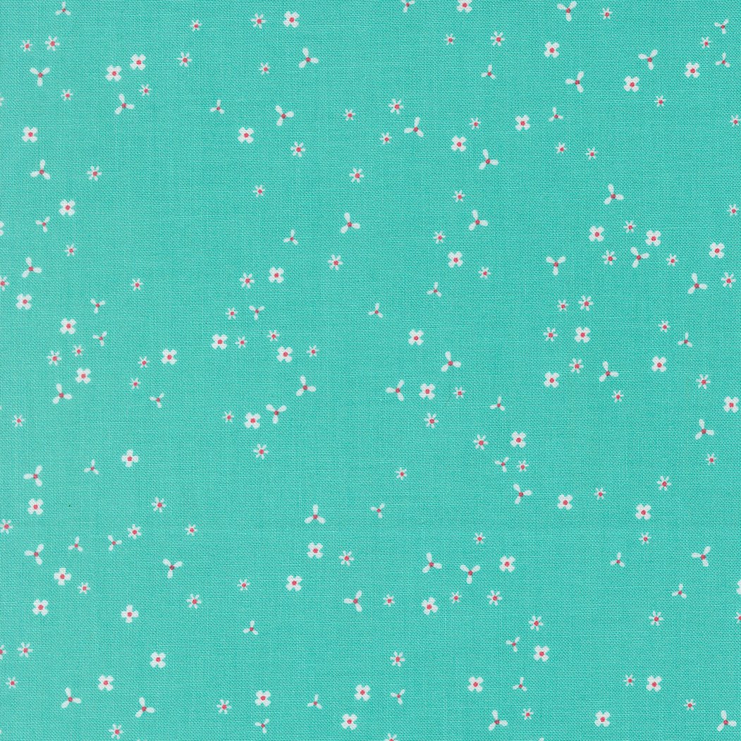 In the Garden Flutter Bermuda fabric by Corey Yoder teal background with small white and pink flowers for quilting and crafts