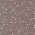 In the Garden Flutter Slate fabric by Corey Yoder with small white floral pattern on slate gray background